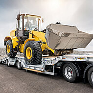 Humbaur: Radlader und Mobilbagger sicher transportieren