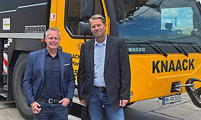 Kran- und Schwerlastkapazitäten von Hüffermann und Knaack bündeln