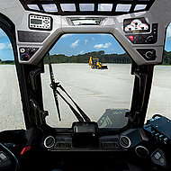 Kompaktlader punktet mit lasergesteuertem Grader