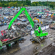 SENNEBOGEN: Schrott-Recycler SYNETIQ erstrahlt in Gr&uuml;n mit  SENNEBOGEN 830 E-Serie