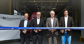 Symbolische Übergabe der neuen Lagerhalle bei BU Power Systems