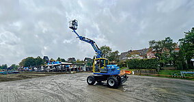 Mobilbagger wird zu fahrbarer Hubarbeitsbühne