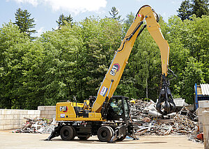 Drosdz Rohstoffrecycling den Cat Umschlagbaggers MH3032 mit Zeppelin Quick Connect 