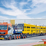 Die Tram huckepack nehmen