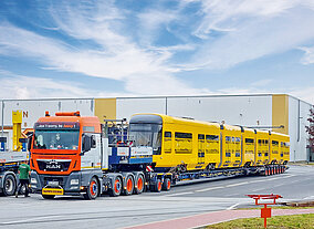 Die Tram huckepack nehmen