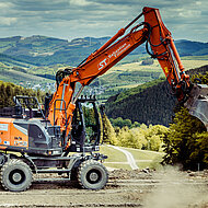 Mit dem Hitachi ZX175W-7 im Downhill-Paradies Greenhill-Bikepark