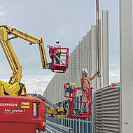 Zeppelin Rental: Ismaning errichtet L&auml;rmschutzwand an Dauerbaustelle